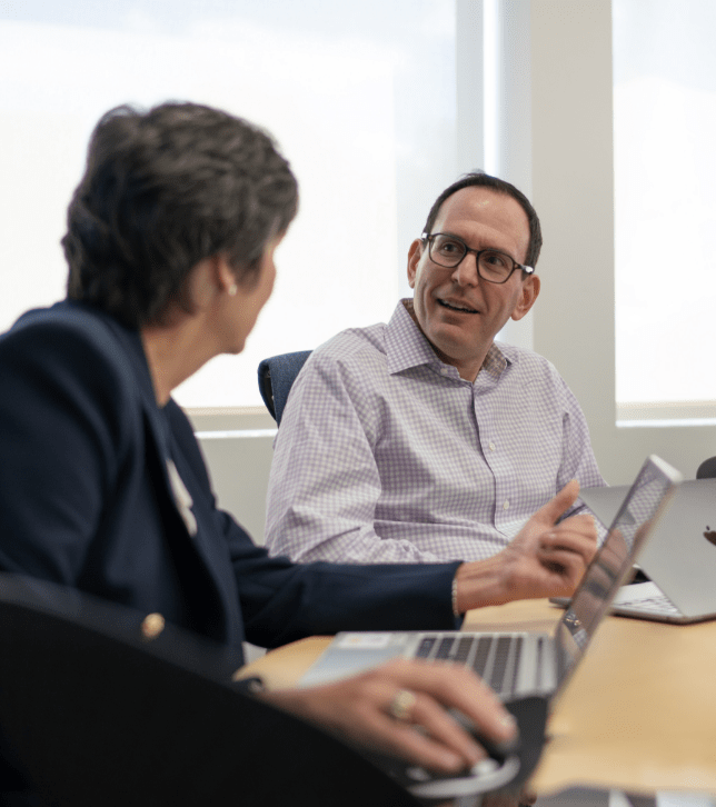 Mary Frances Harmon and Matt Klein in a meeting